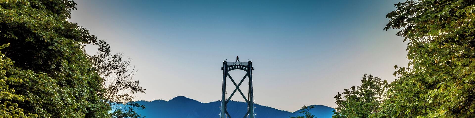 View from the Bridge in Stanley Park. The Lions Gate Bridge, opened in 1938, officially known as the First Narrows Bridge, is a suspension bridge that crosses the first narrows of Burrard Inlet and c