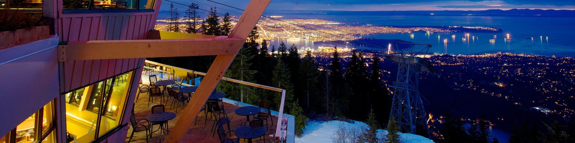 Grouse Mountain featuring night scenes, a city and views