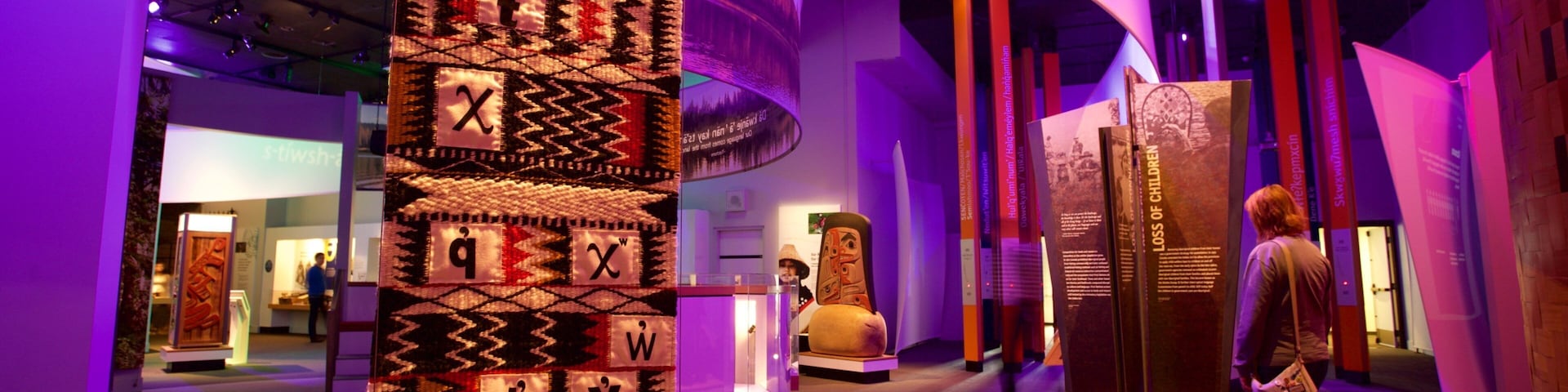 Royal BC Museum featuring interior views as well as an individual femail