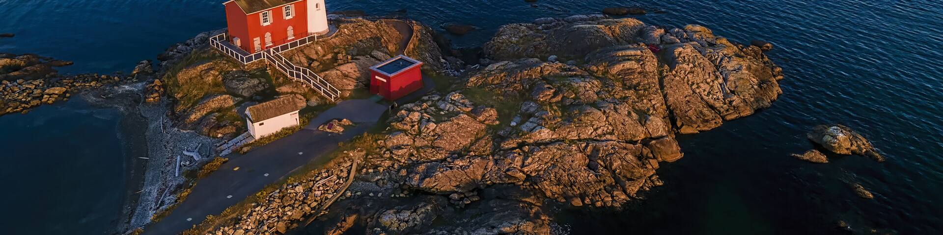 High angle shot of a Fisgard Lighthouse and Fort Rodd Hill in Colwood, Canada