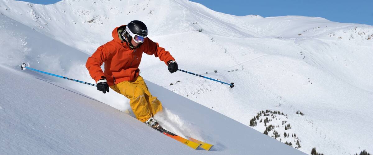 Marmot Basin showing snow skiing and snow as well as an individual male