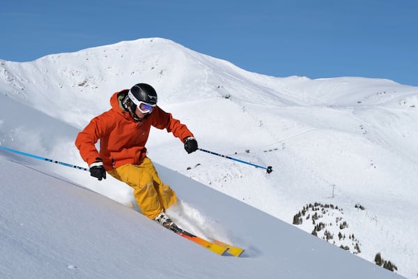 Marmot Basin showing snow and snow skiing as well as an individual male
