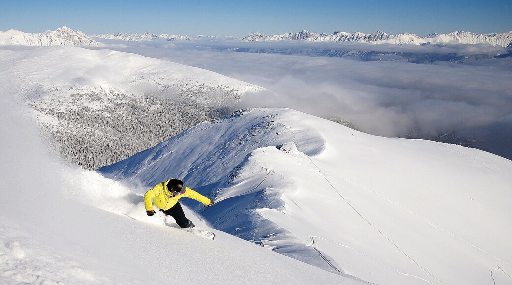 Marmot Basin which includes snow, mountains and landscape views