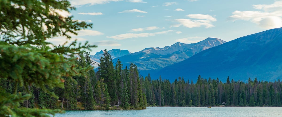 Lake Annette which includes a lake or waterhole and mountains