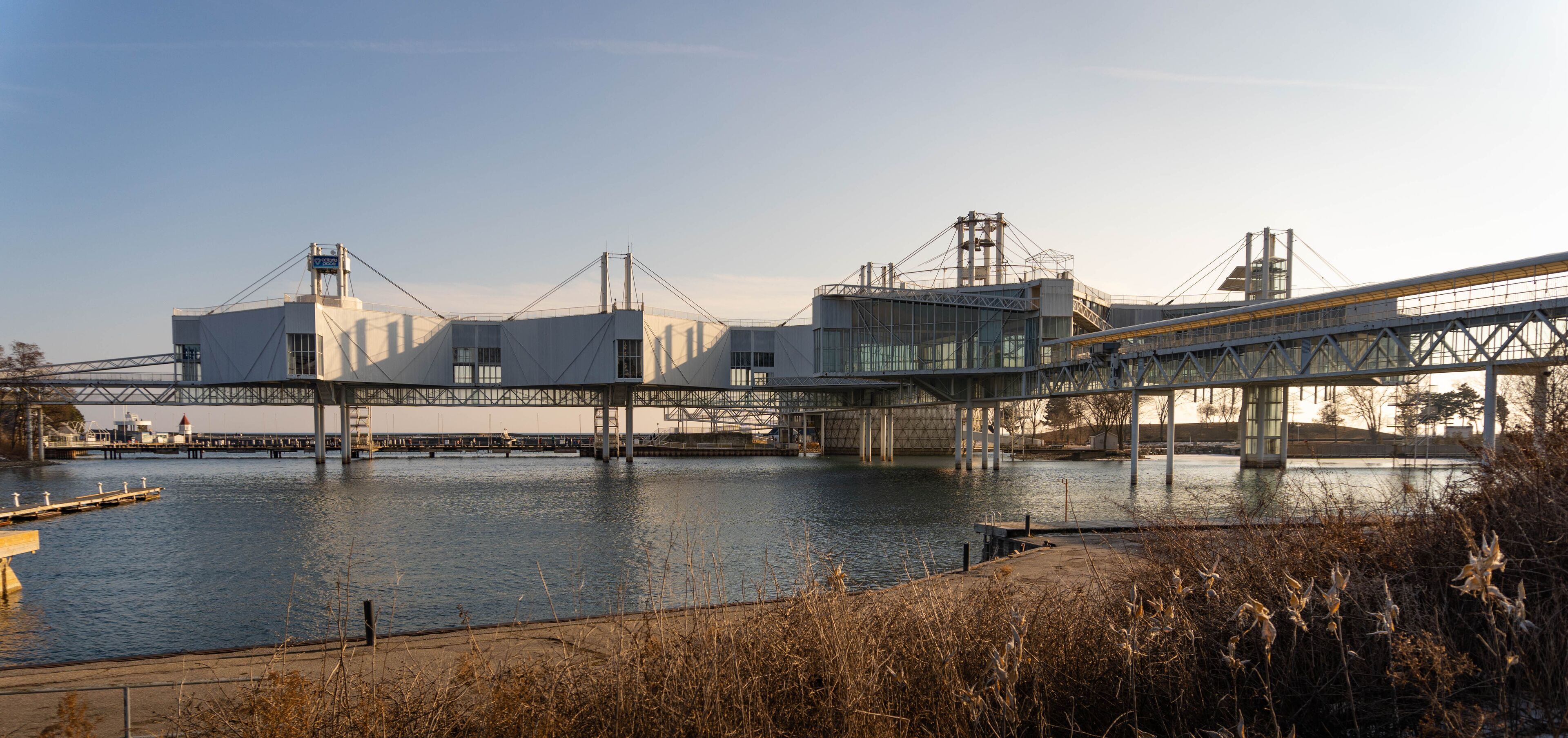 The Atlantis buildings of the former Ontario Place stand on piles above the waters of Lake Ontario.