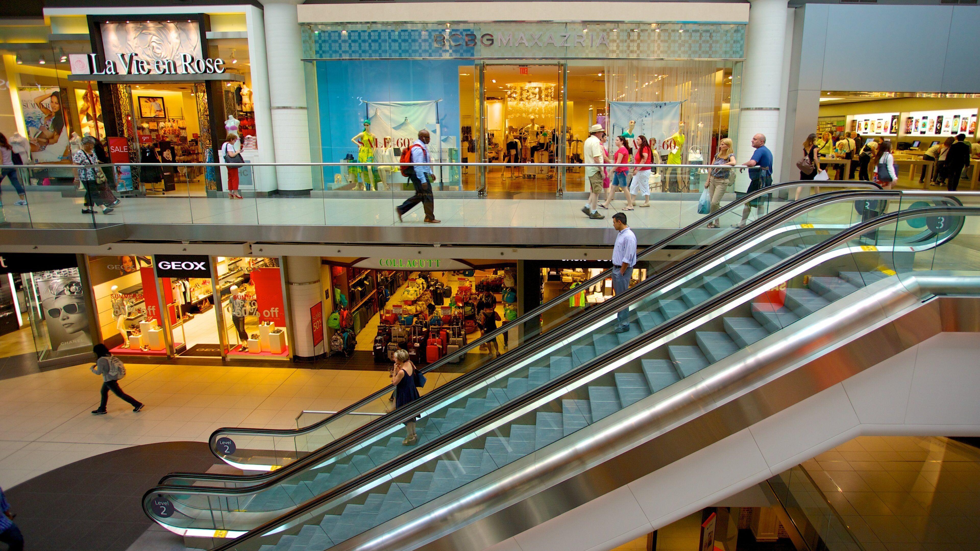 Toronto Eaton Centre featuring central business district, shopping and interior views