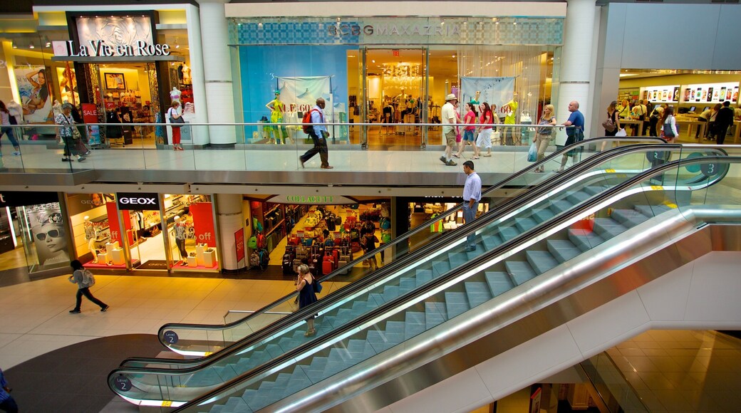 Toronto Eaton Centre featuring central business district, shopping and interior views