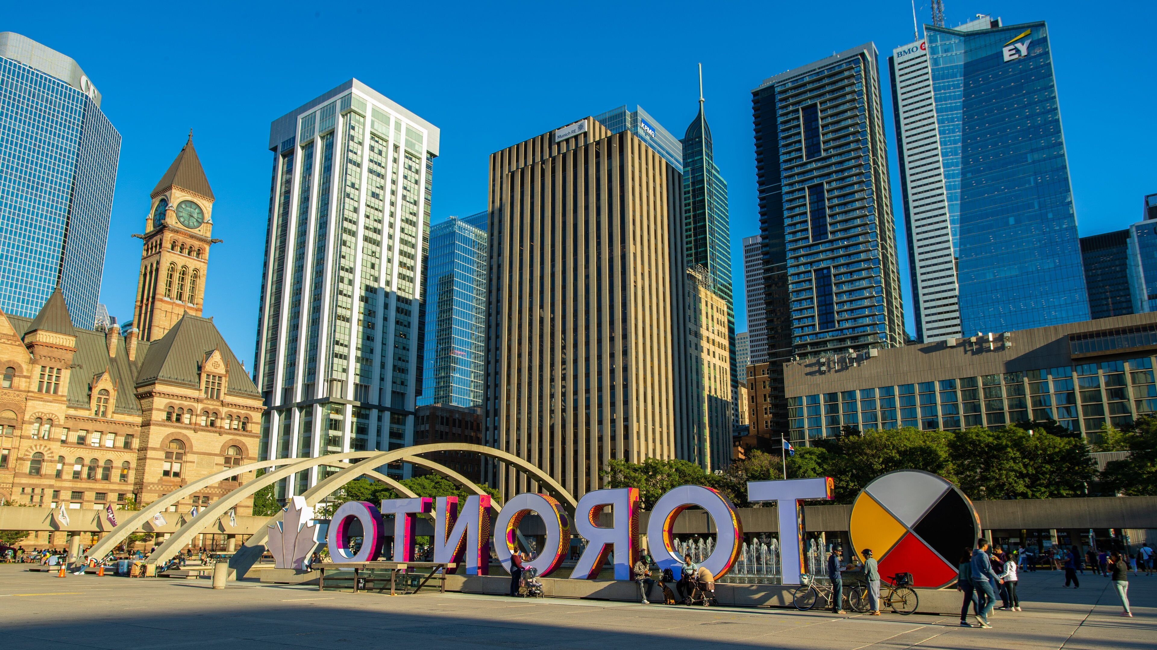 Nathan Phillips Square which includes a city and signage