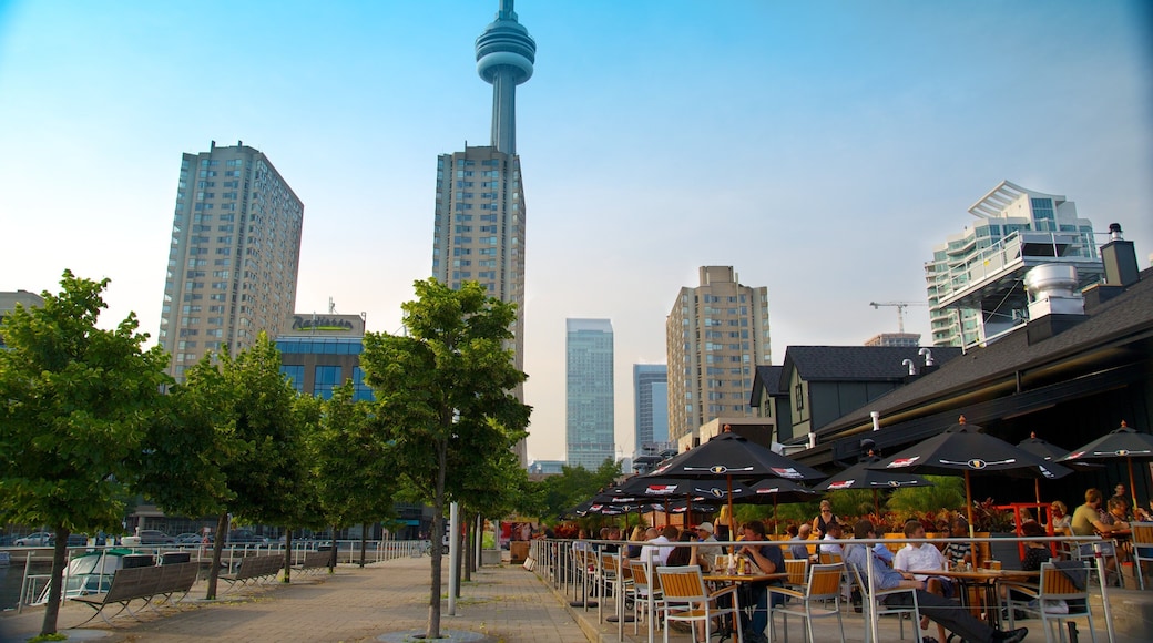 Harbourfront Centre which includes modern architecture, a high rise building and outdoor eating