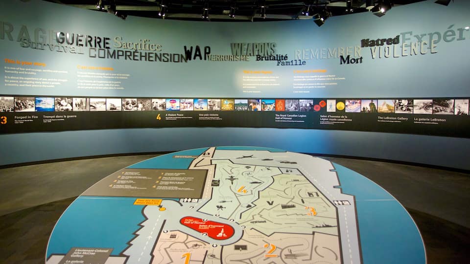 A museum exhibit with a large map and informational panels.