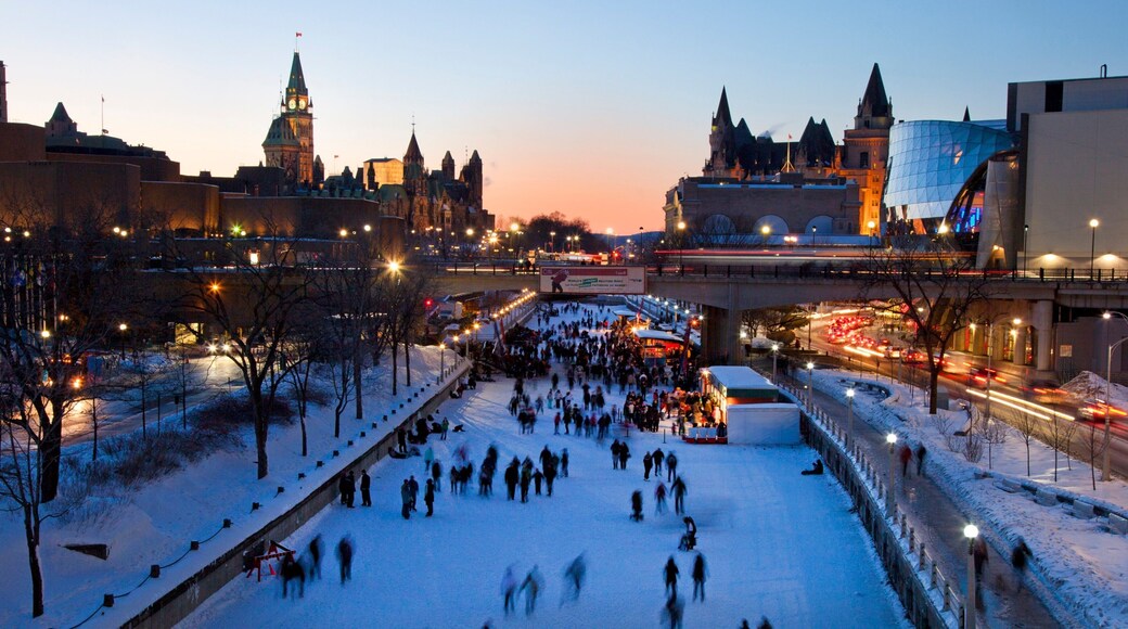 Rideau Canal featuring snow, a sunset and a city
