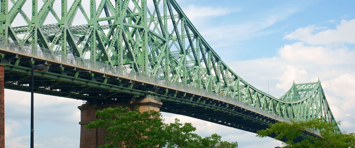 Jacques Cartier bridge crossing Saint Lawrence river in Montreal