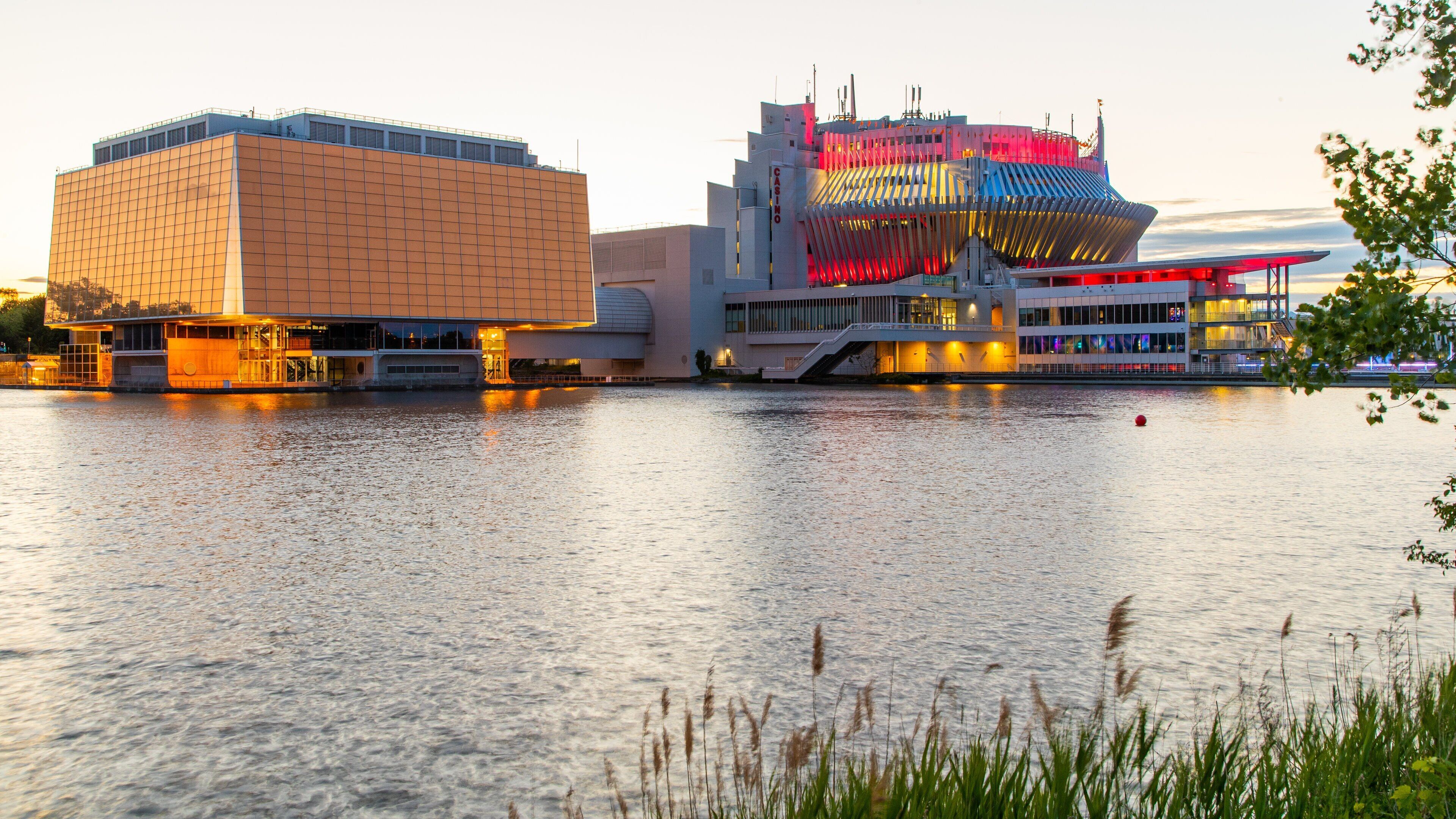 Montreal Casino featuring a lake or waterhole and modern architecture