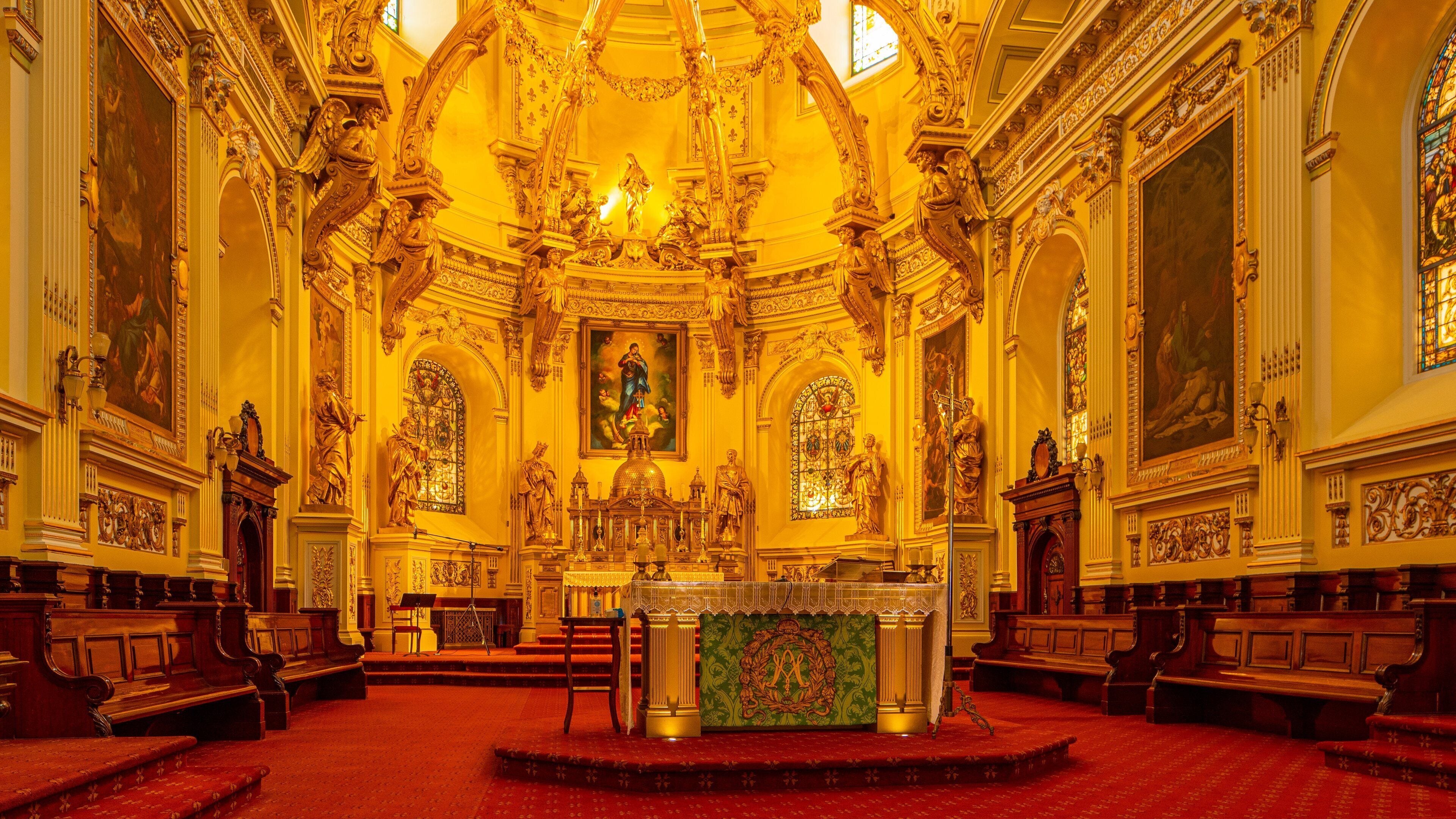 Basilique Cathedrale Notre-Dame of Quebec featuring a church or cathedral, heritage elements and interior views