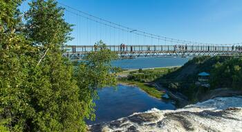 Montmorency Falls featuring a bridge and general coastal views