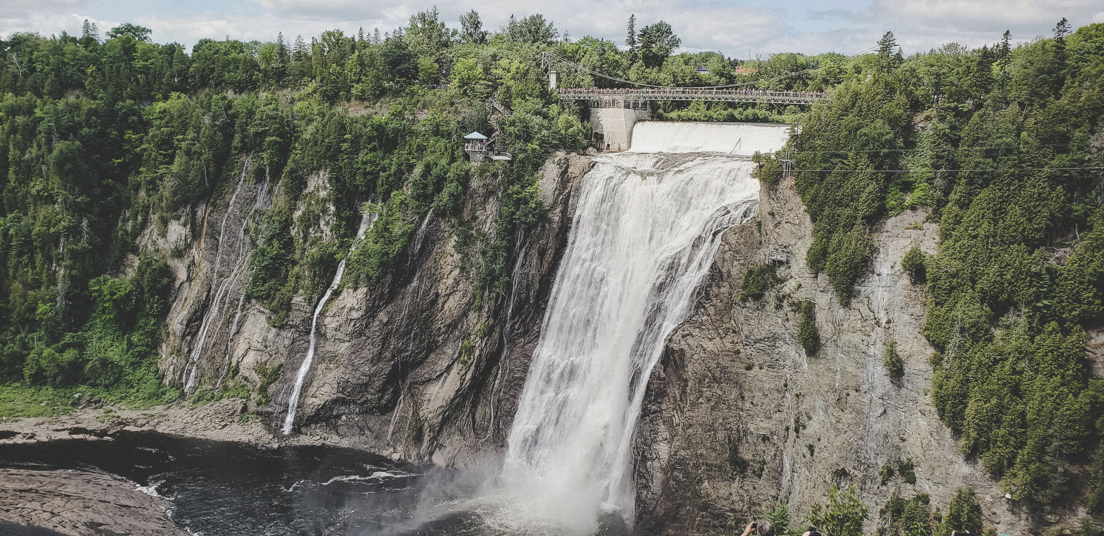 The last stop on this trip was a visit to Montmorrency Falls. While this was quite the site to see, if you don't go there at the crack of dawn during the summer months, you can expect to be one of thousands of people trying to shove their way through. So... leave early and wear comfortable shoes! The hike is fairly small (and not really a hike - more of a path) to get to the actual falls - but the stairs to climb down there are plenty. There is no entrance fee to get into the park, but there is a fee if you choose to do the zip-lining.