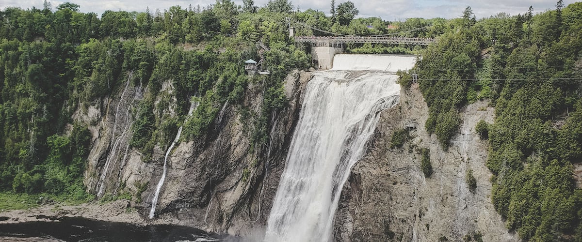 The last stop on this trip was a visit to Montmorrency Falls. While this was quite the site to see, if you don't go there at the crack of dawn during the summer months, you can expect to be one of thousands of people trying to shove their way through. So... leave early and wear comfortable shoes! The hike is fairly small (and not really a hike - more of a path) to get to the actual falls - but the stairs to climb down there are plenty. There is no entrance fee to get into the park, but there is a fee if you choose to do the zip-lining.