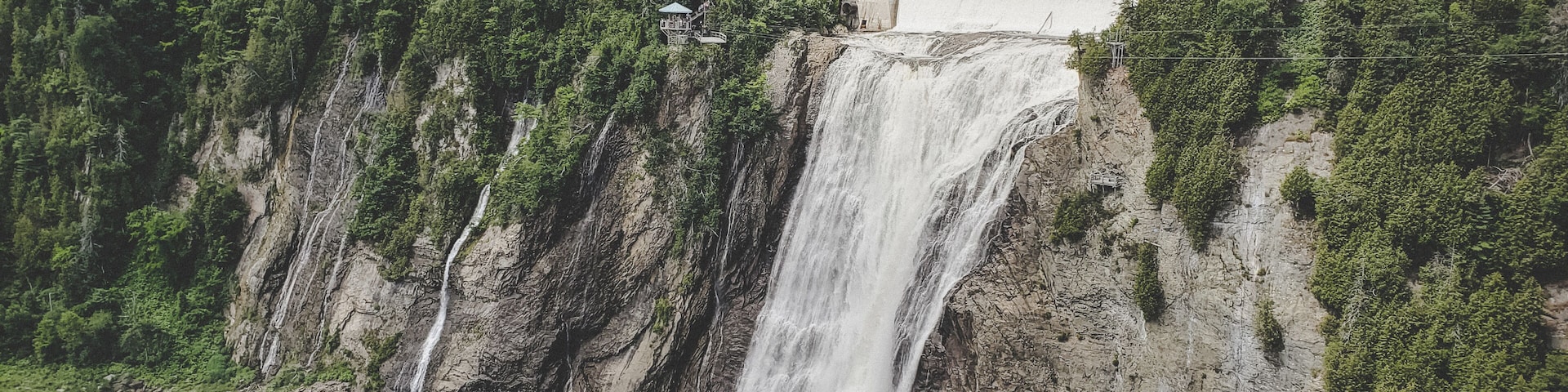 The last stop on this trip was a visit to Montmorrency Falls. While this was quite the site to see, if you don't go there at the crack of dawn during the summer months, you can expect to be one of thousands of people trying to shove their way through. So... leave early and wear comfortable shoes! The hike is fairly small (and not really a hike - more of a path) to get to the actual falls - but the stairs to climb down there are plenty. There is no entrance fee to get into the park, but there is a fee if you choose to do the zip-lining.