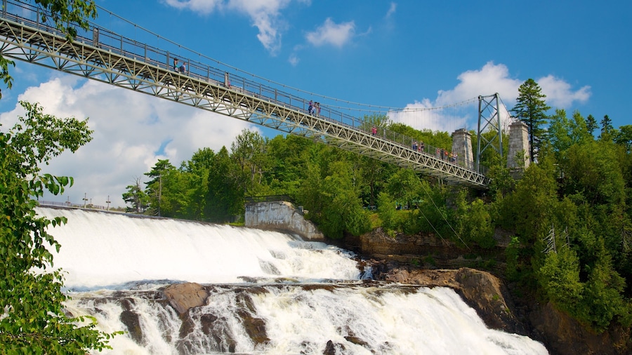 Montmorency Falls featuring a suspension bridge or treetop walkway, a river or creek and a bridge