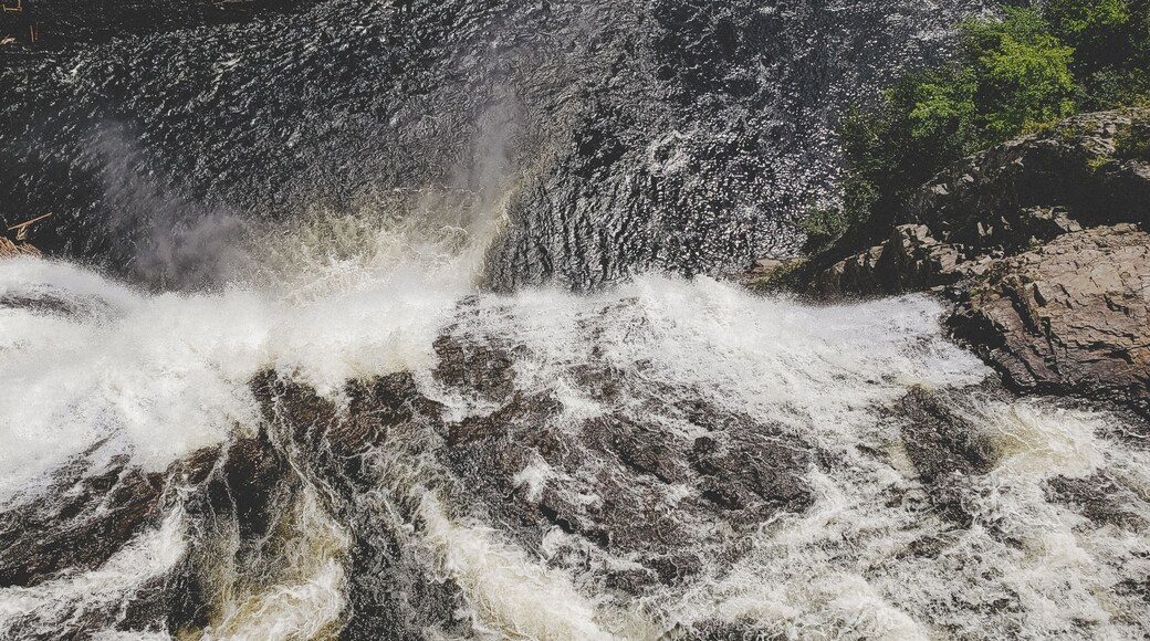 The last stop on this trip was a visit to Montmorrency Falls. While this was quite the site to see, if you don't go there at the crack of dawn during the summer months, you can expect to be one of thousands of people trying to shove their way through. So... leave early and wear comfortable shoes! The hike is fairly small (and not really a hike - more of a path) to get to the actual falls - but the stairs to climb down there are plenty. There is no entrance fee to get into the park, but there is a fee if you choose to do the zip-lining.