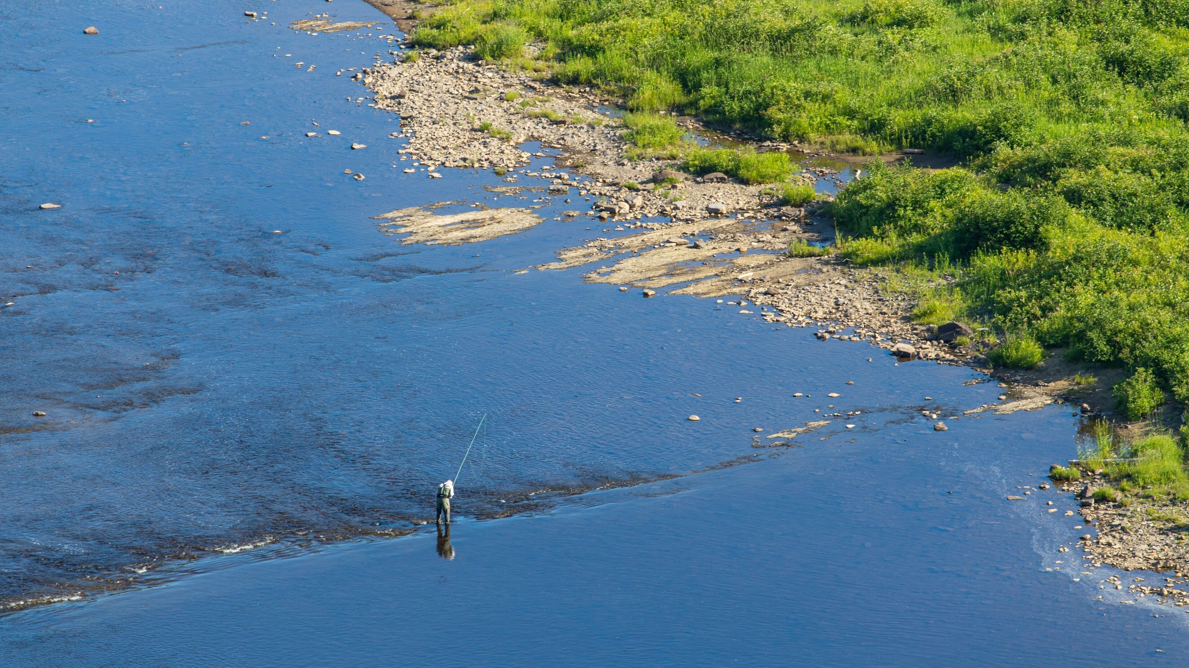 Montmorency Falls showing fishing and a river or creek