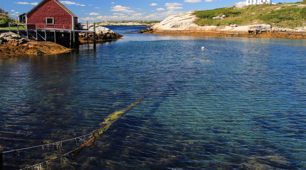 A nice sunny day at Peggy's Cove, Nova Scotia. A very popular small fishing village that is a great place to visit and see the lighthouse and its many picture opportunities.