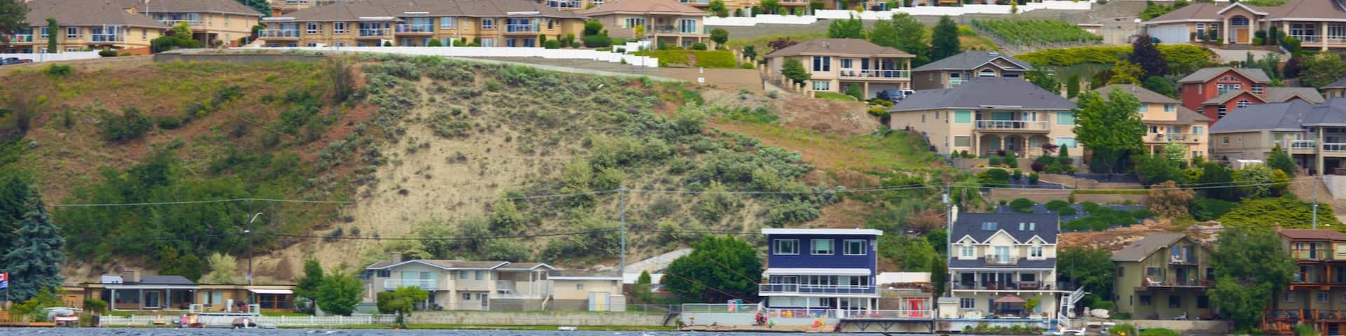 Okanagan Beach featuring kite surfing, a small town or village and general coastal views