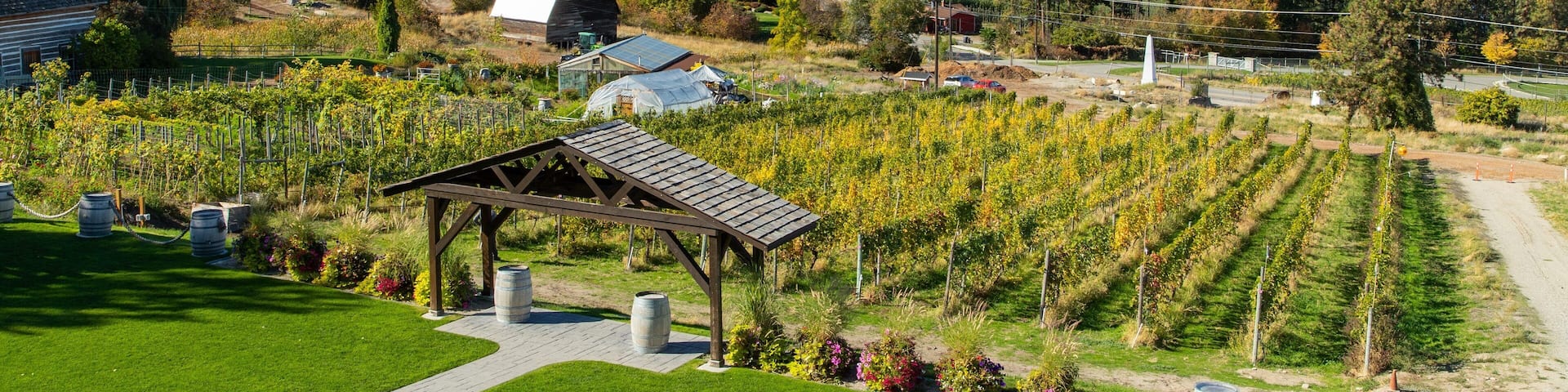 Summerhill Pyramid Winery which includes farmland, landscape views and a lake or waterhole