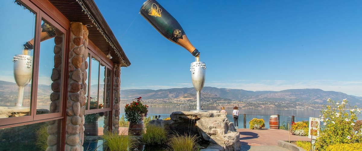 Summerhill Pyramid Winery featuring a garden, outdoor art and views
