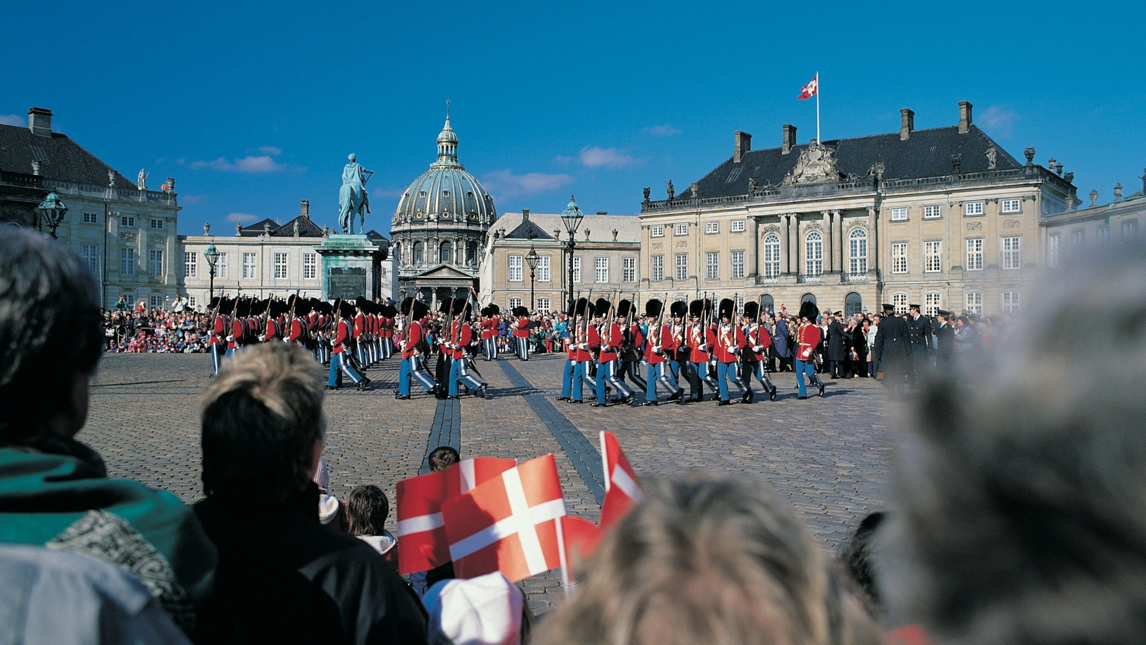 Amalienborg Palace which includes street performance, performance art and a square or plaza