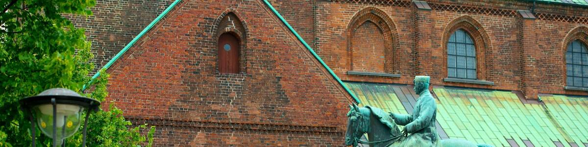 Church of Our Lady featuring a statue or sculpture, heritage elements and a church or cathedral