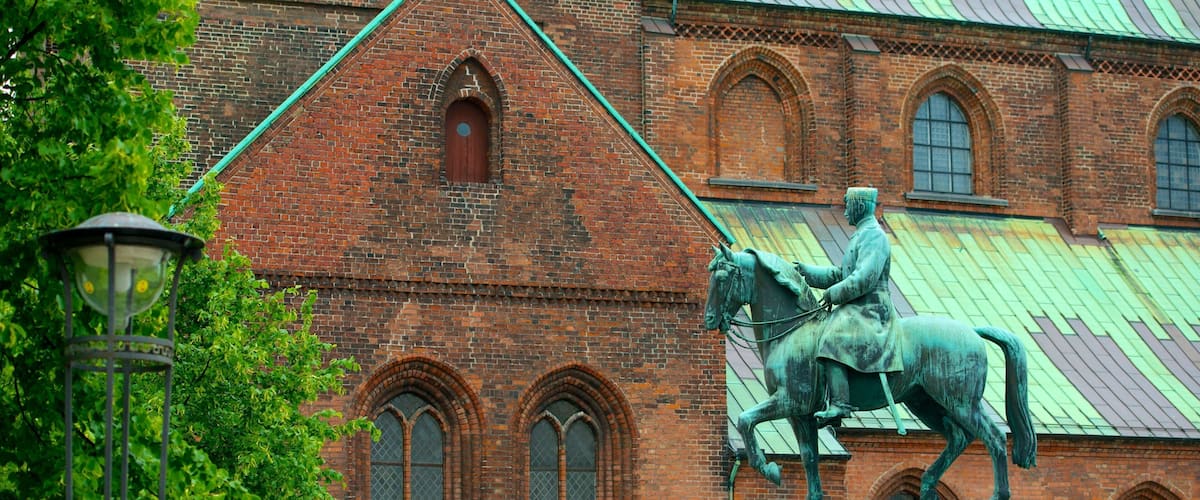 Church of Our Lady featuring a statue or sculpture, heritage elements and a church or cathedral