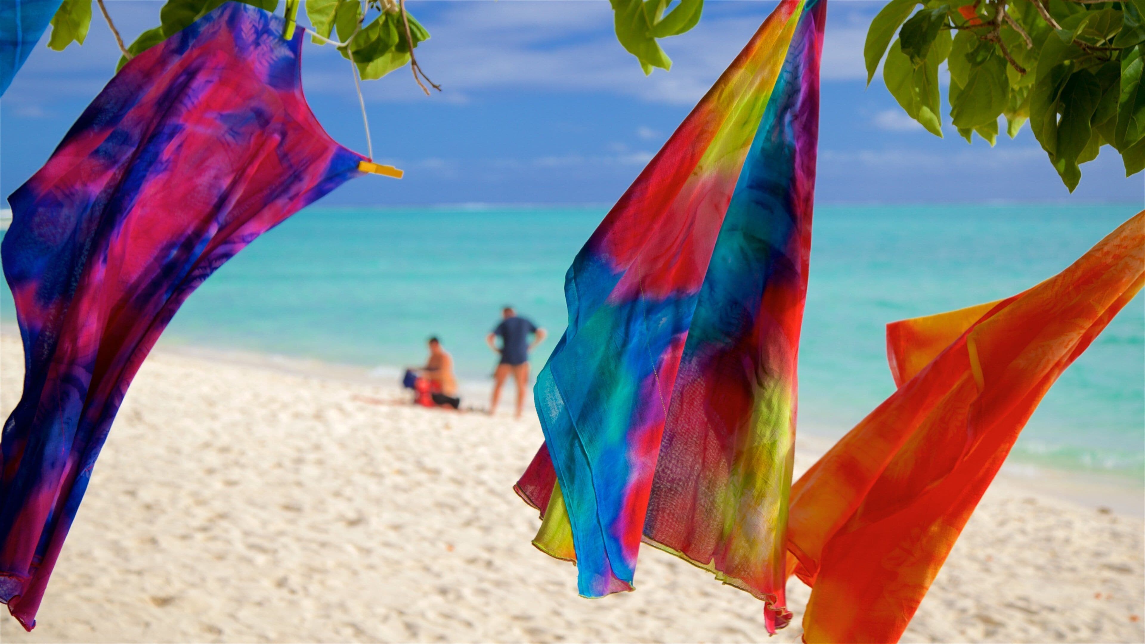 Matira Beach showing a sandy beach and general coastal views