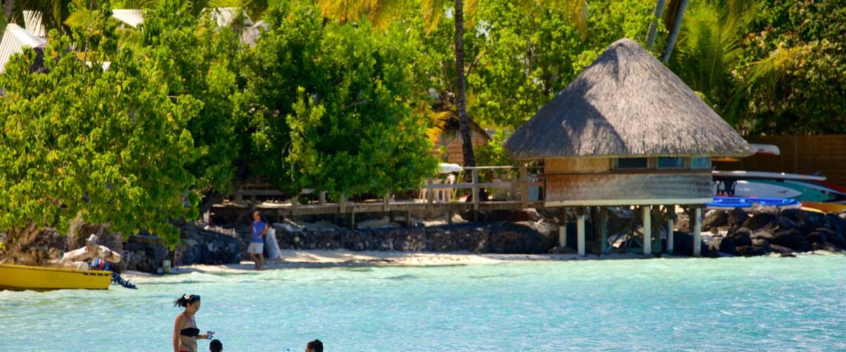 Matira Point which includes tropical scenes, general coastal views and swimming