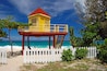 ellow and red lifeguard booth on Grand Anse Beach on Grenada Island