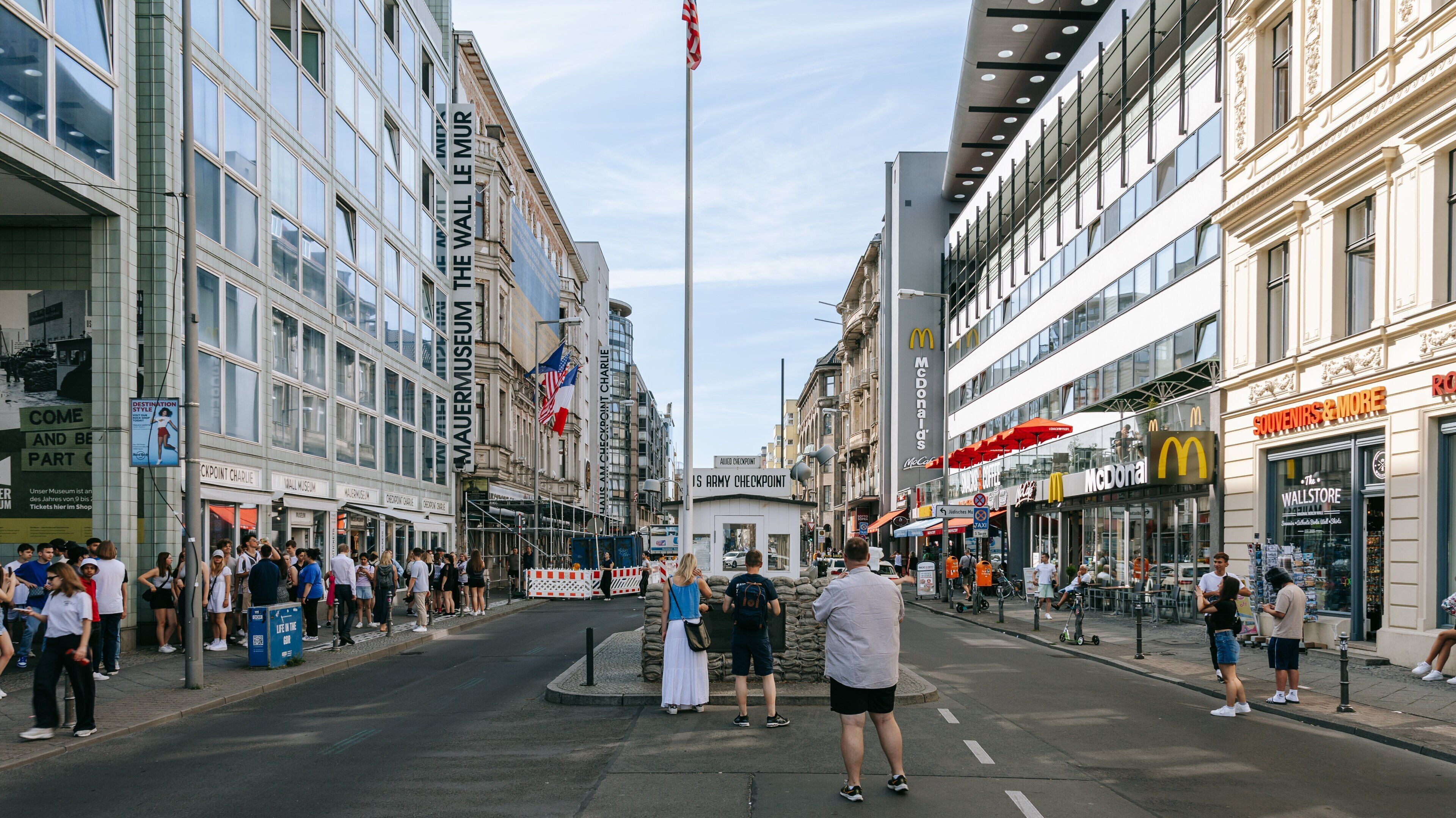 Checkpoint Charlie Museum showing a city and street scenes