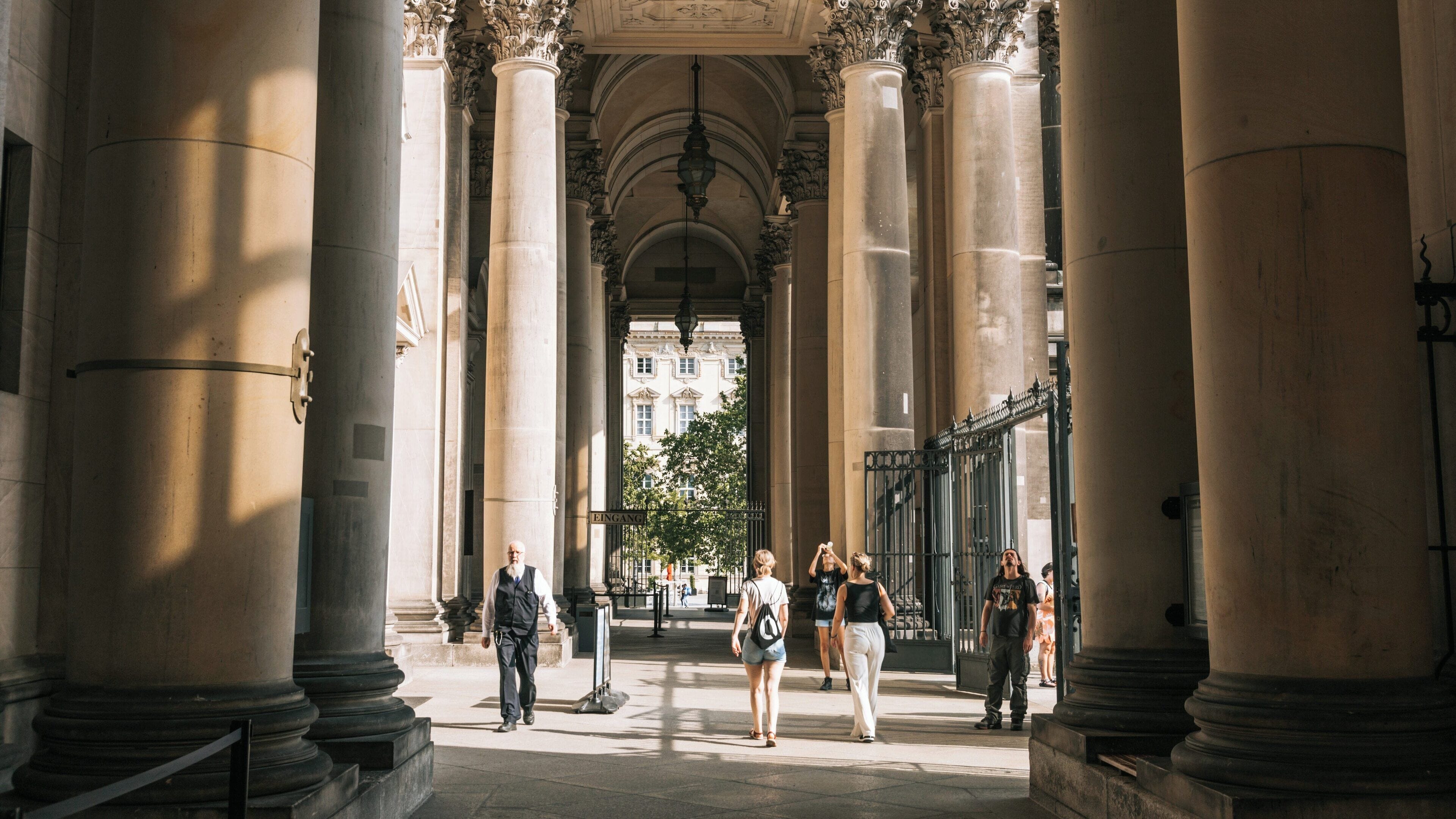 Berlin Cathedral stands majestically in Mitte with visitors enjoying the remarkable architecture and serene atmosphere during a sunny day in Brandenburg Region, Germany
