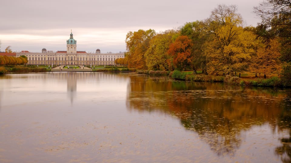 Reflection of Schloss Charlottenburg amidst autumn foliage in Berlin's Brandenburg Region