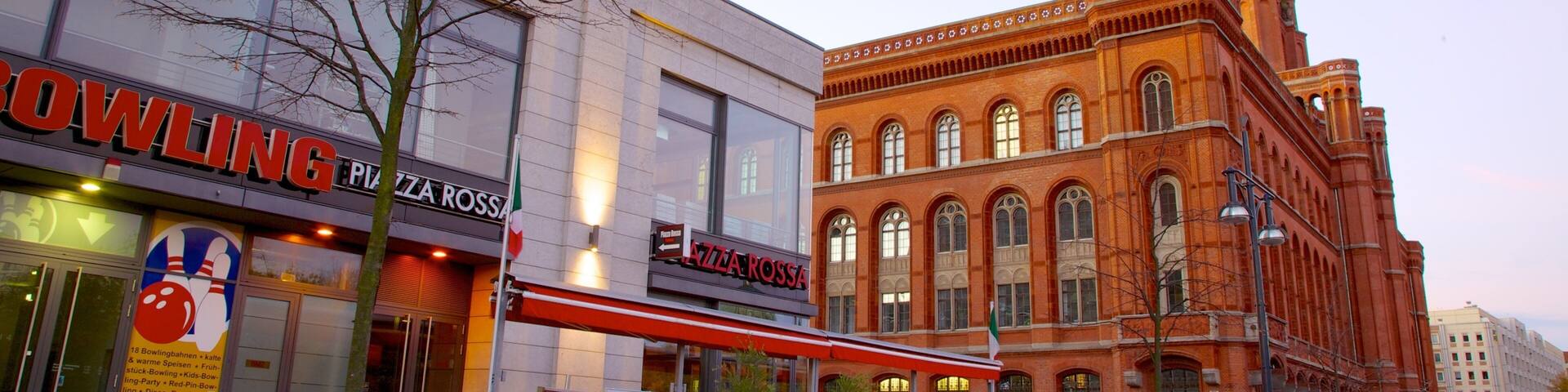 Red Town Hall which includes heritage architecture, a city and a square or plaza