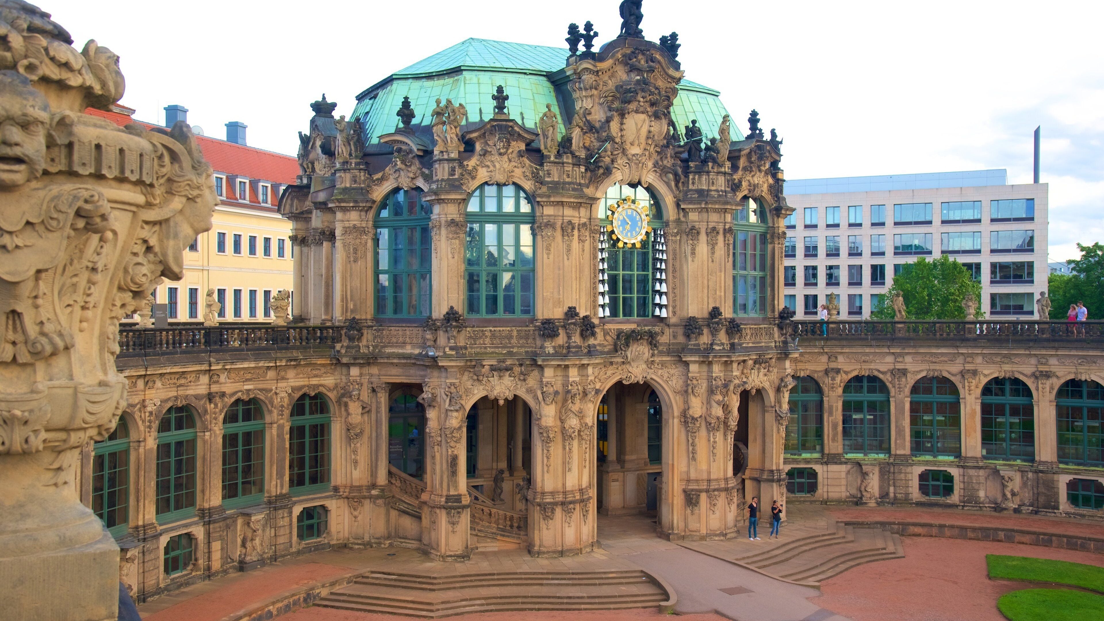 Zwinger Palace showing a castle and a statue or sculpture