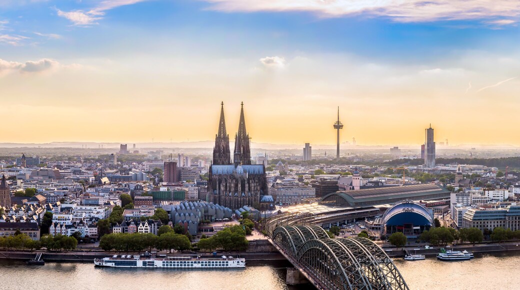 Panorama of Cologne with Cologne Cathedral and the Rhine on a beautiful summer evening