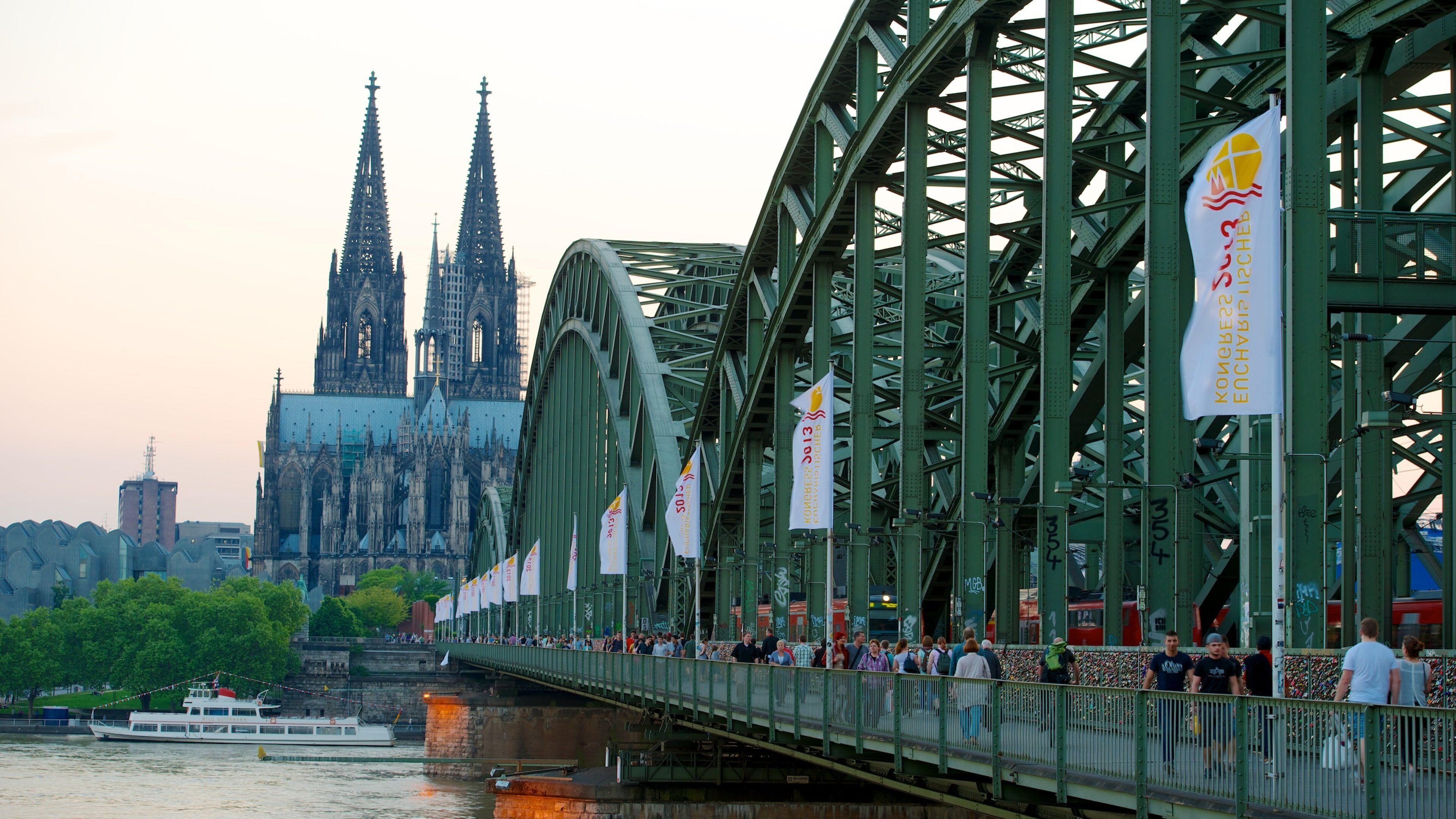 Cologne Cathedral featuring a city, a church or cathedral and a bridge