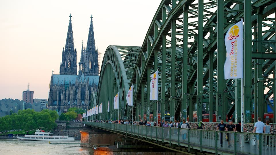 Cologne Cathedral featuring a city, a church or cathedral and a bridge