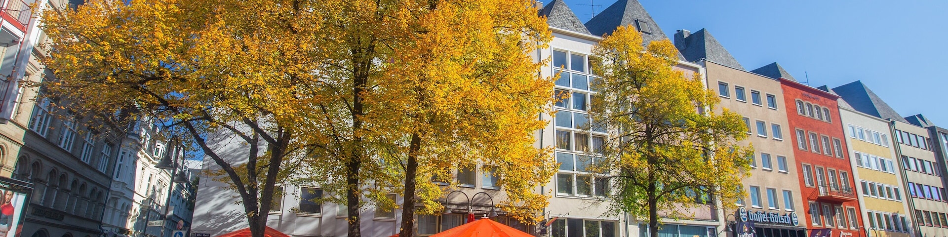 Alter Markt showing outdoor eating and a city as well as a small group of people