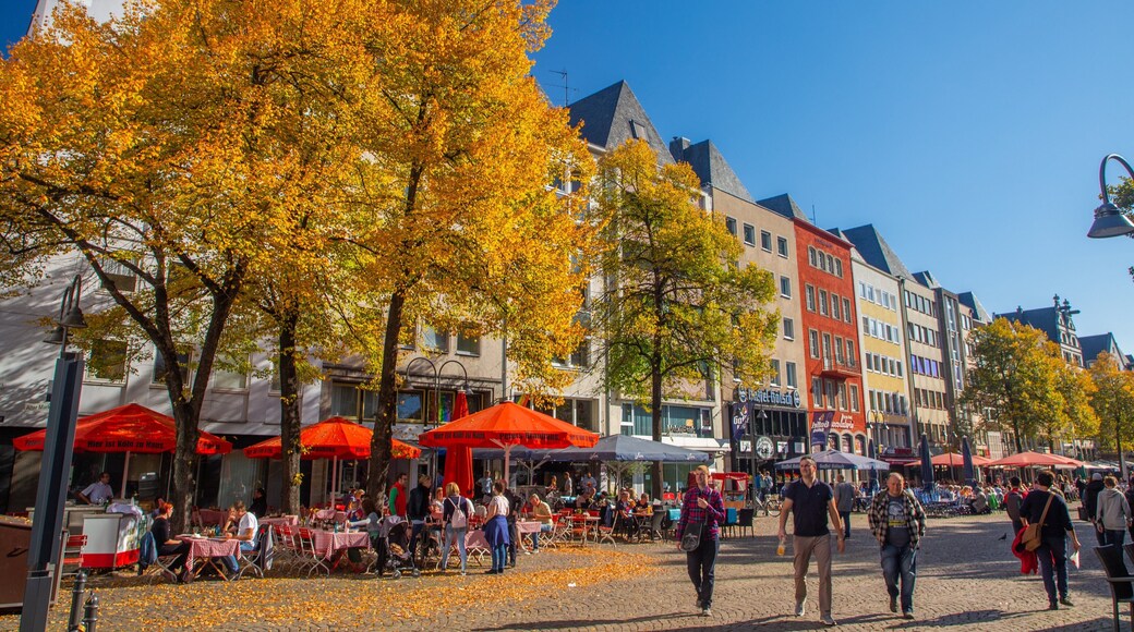 Alter Markt which includes street scenes, fall colors and outdoor eating