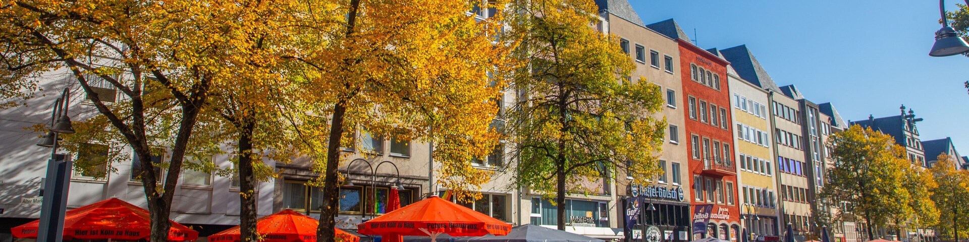 Alter Markt which includes street scenes, fall colors and outdoor eating