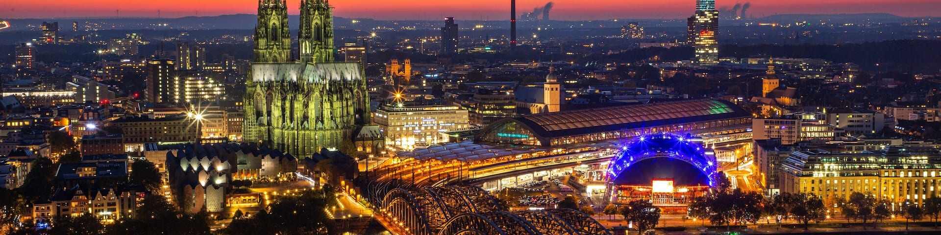 Hohenzollern Bridge showing a river or creek, heritage architecture and a city
