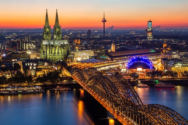 Hohenzollern Bridge showing a river or creek, heritage architecture and a city