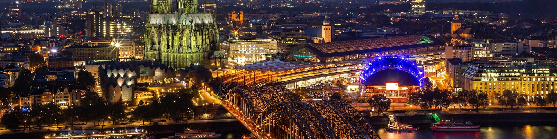 Hohenzollern Bridge showing a river or creek, heritage architecture and a city