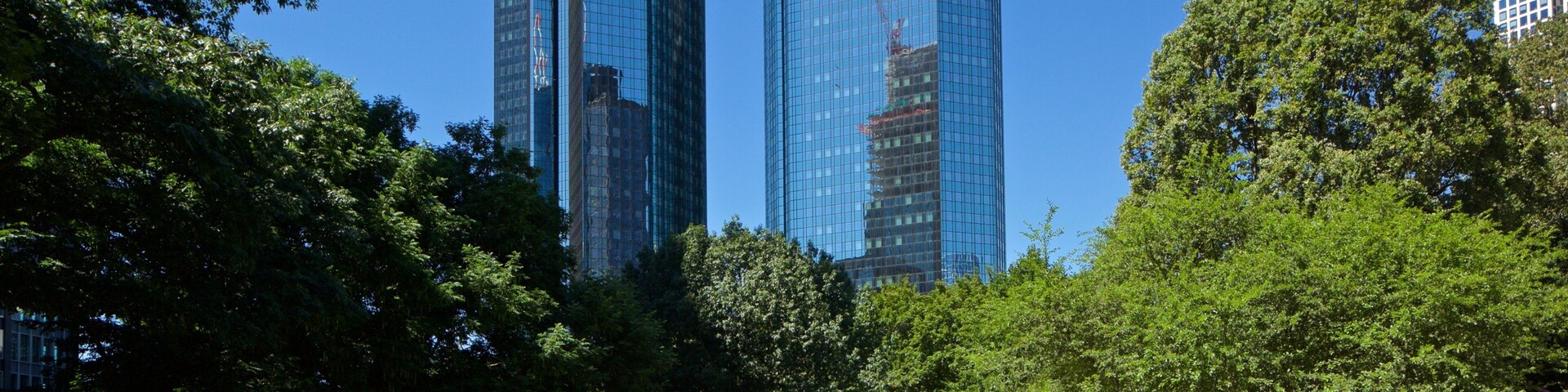 Deutsche Bank Twin Towers showing a garden and a high rise building